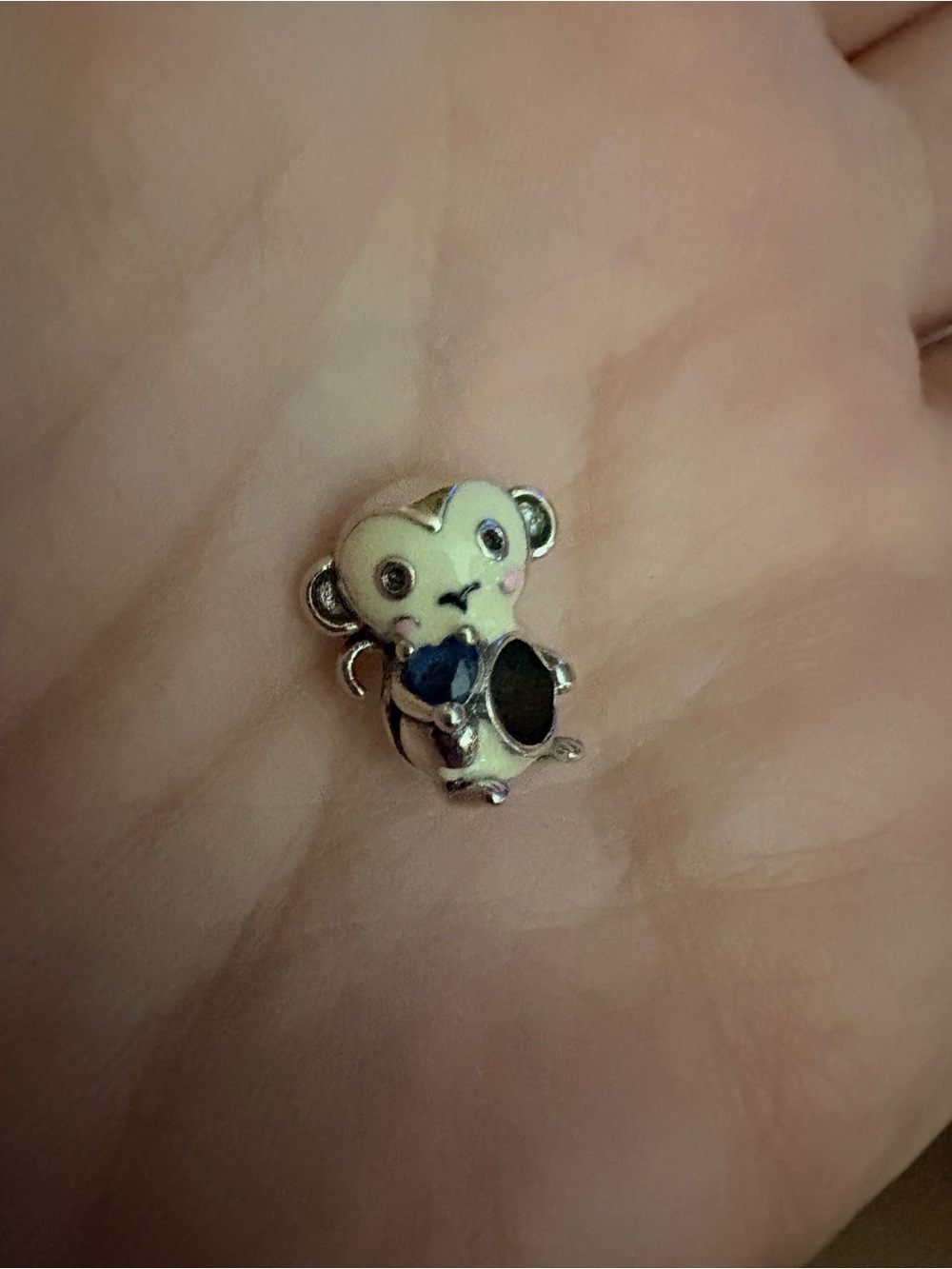 Gnoce monkey charm with blue stone